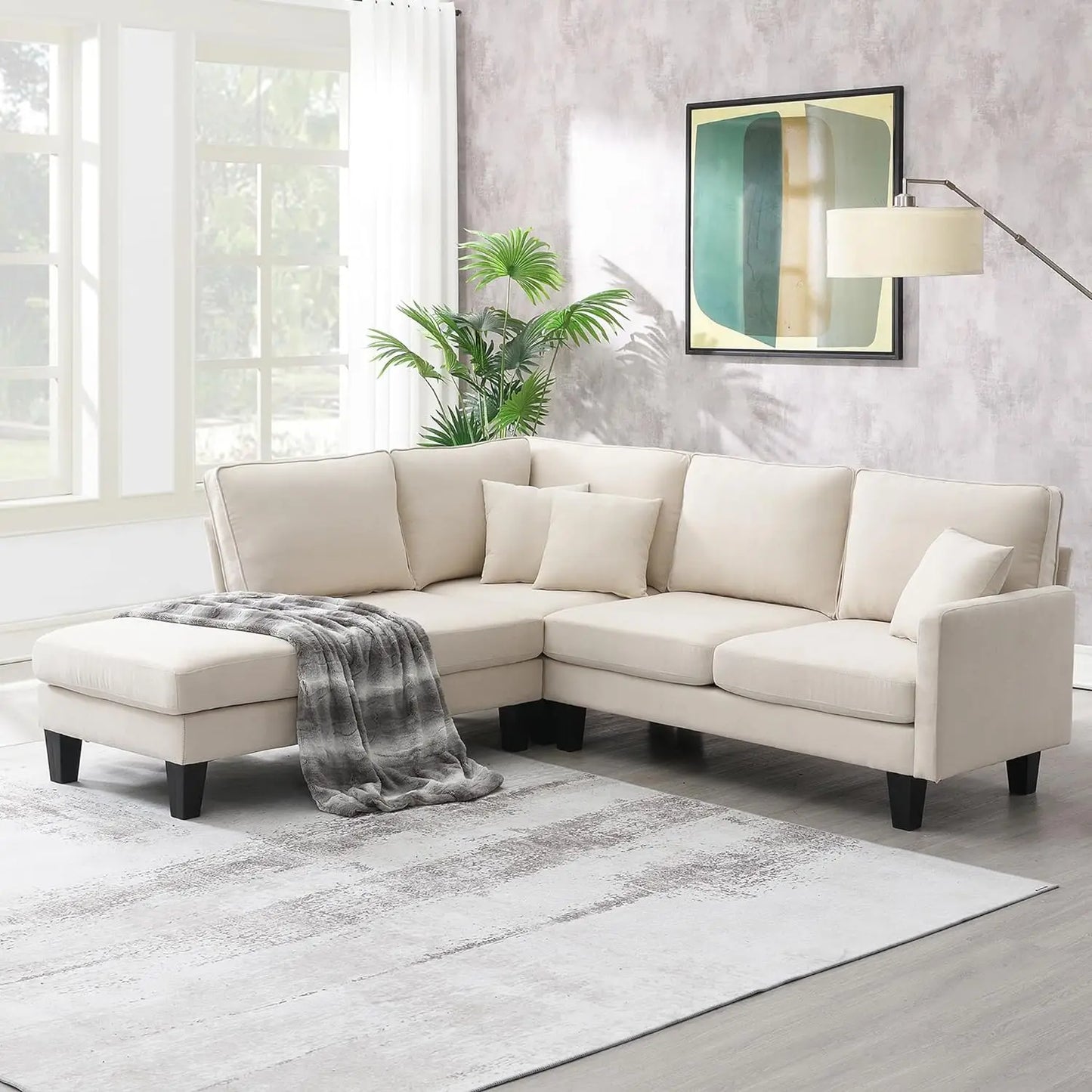 L-Shaped Couch With 2 Pillows Reversible Chaise Lounge.